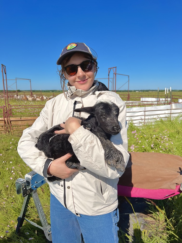 Field picture of Rebecca Tasker Outreach Program Manager.